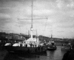 Comet being towed into Methil Harbour
